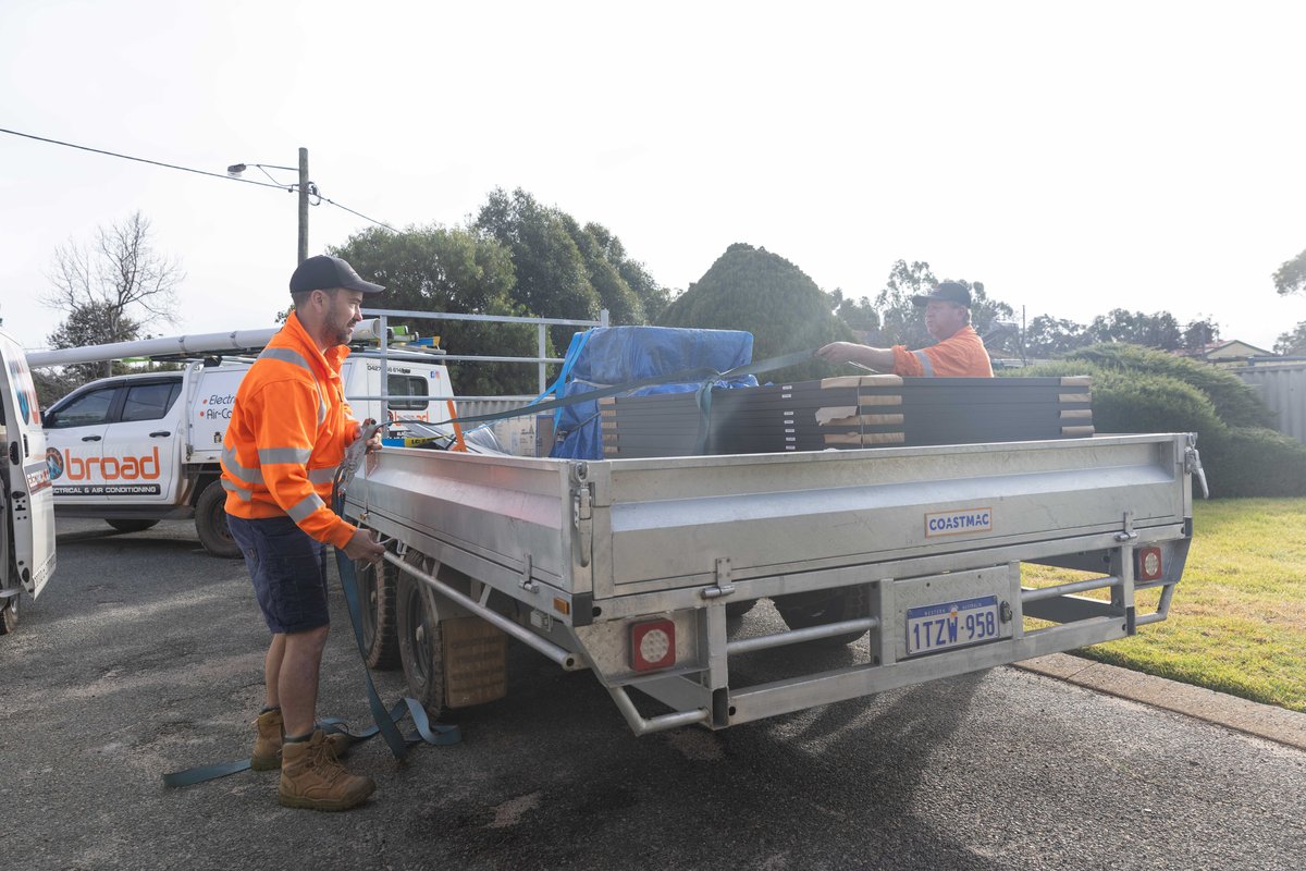 Broad Electrical technicians loading the ute