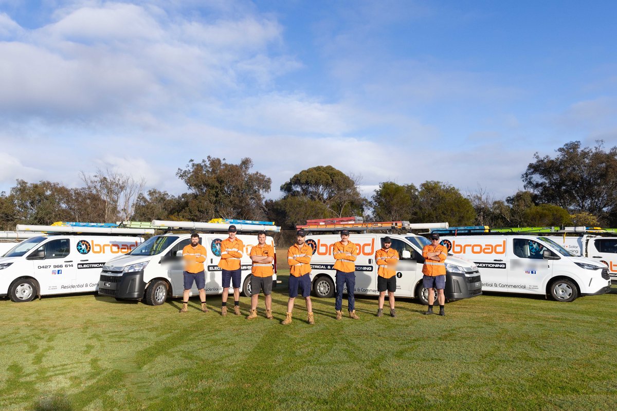 The Broad Electrical team lined up with their vans